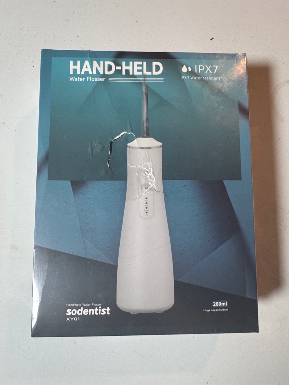 Sodentist Hand-Held Water Flosser in White - IPX7 Portable Oral Care